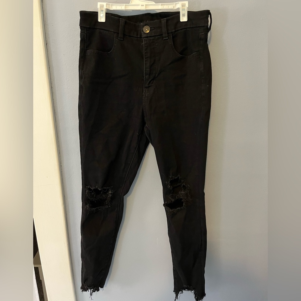 Black distressed skinny jeans